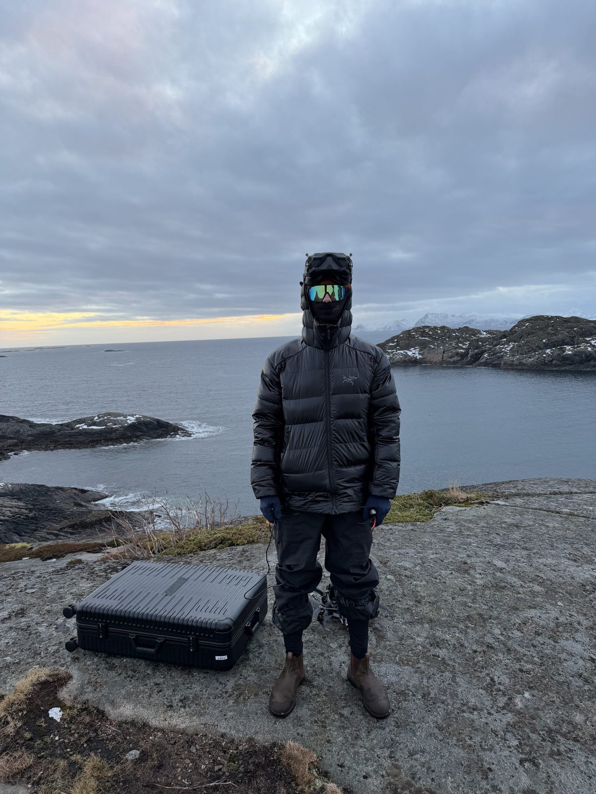 Akailah Yocom on a rocky coastline